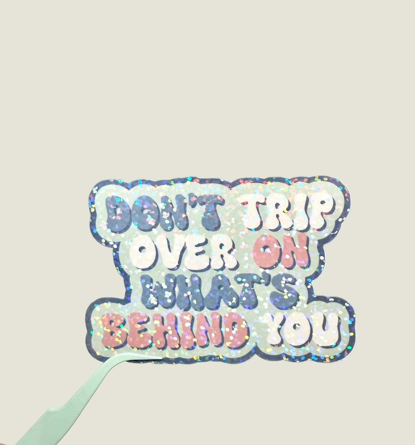 Don’t trip over holographic sticker