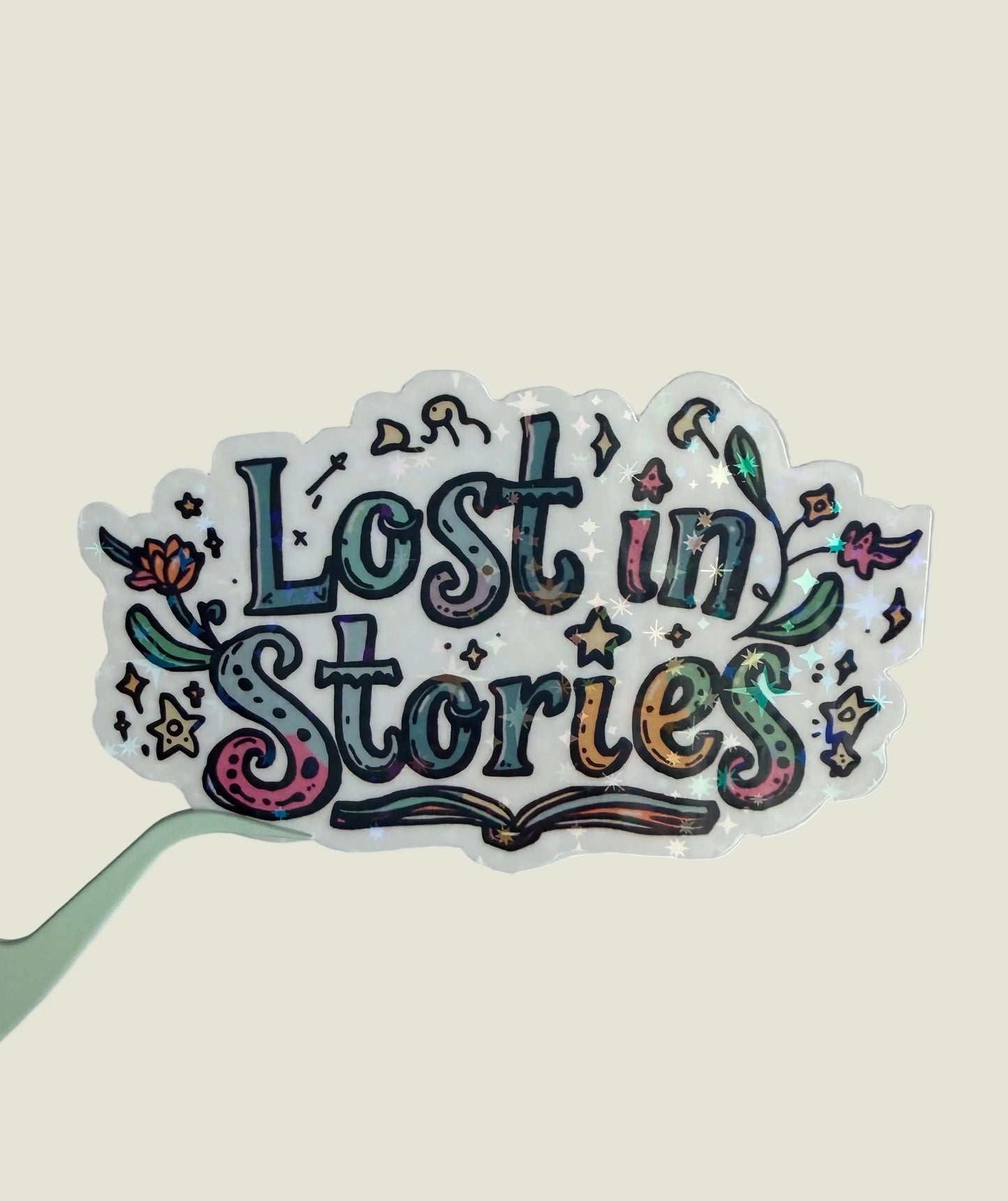 Lost in stories holographic sticker